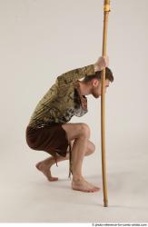 KEETA KNEELING POSE WITH SPEAR